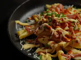 Papas cargadas con topping